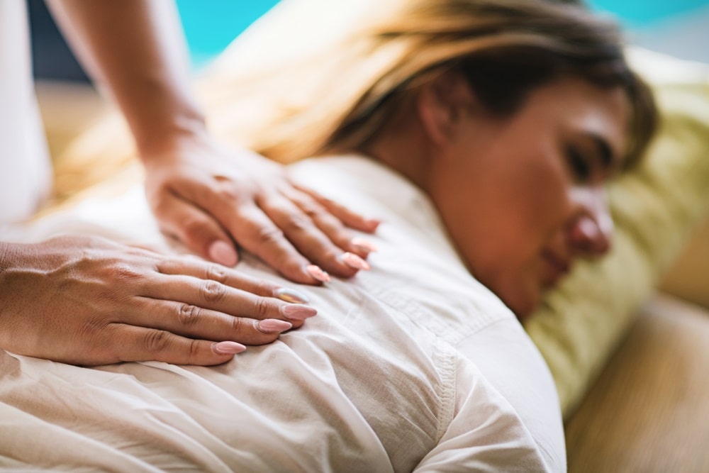 Reiki session for sciatica pain relief