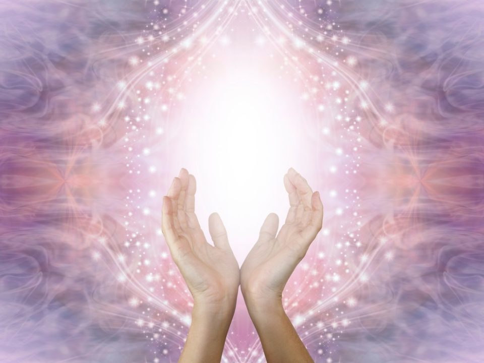 A serene moment of reiki prayer before starting a session, symbolizing peace and healing energy.