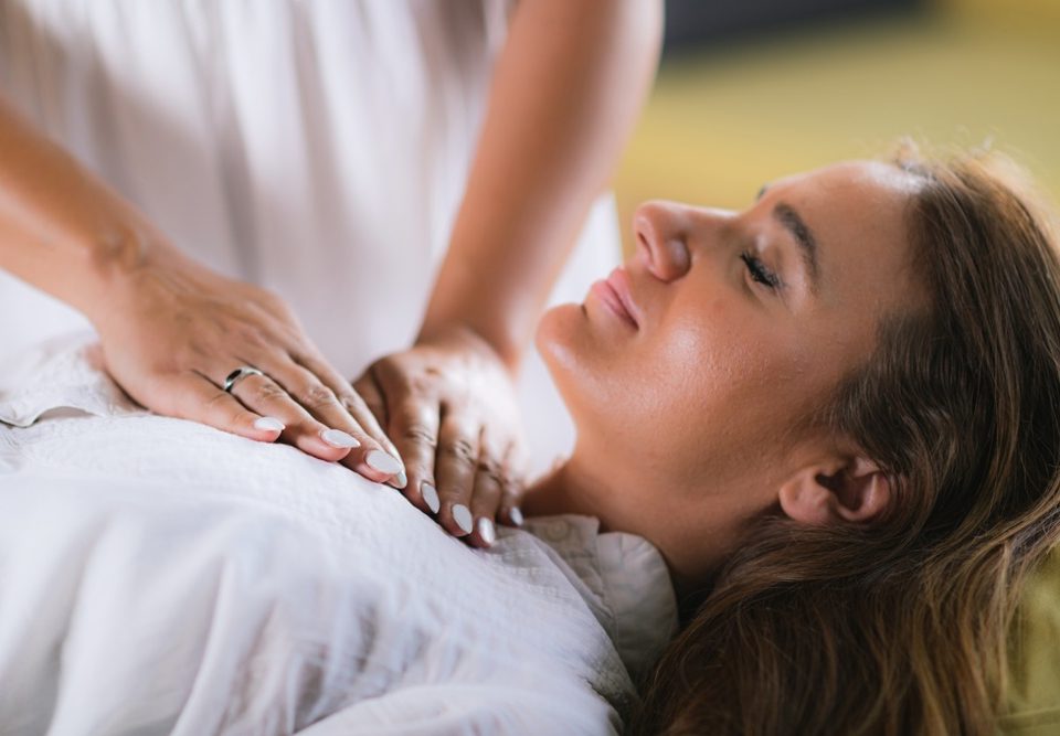 A serene setting with calming symbols representing the Reiki principles for 2024.